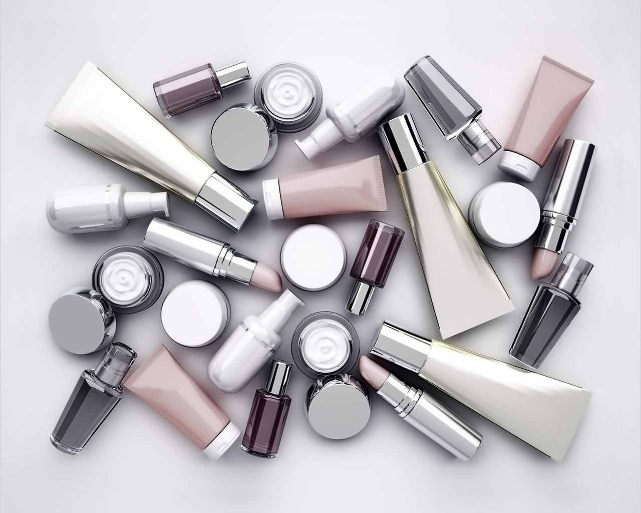 Cosmetic products, lipstik and perfume on gray background. Top view.